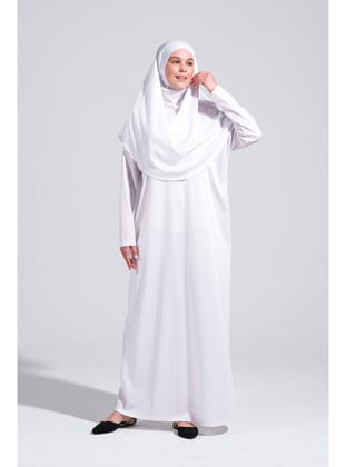2133_Tek Parça Kaymaz Başörtülü Namaz Tesettür Elbisesi Boneye Son.
